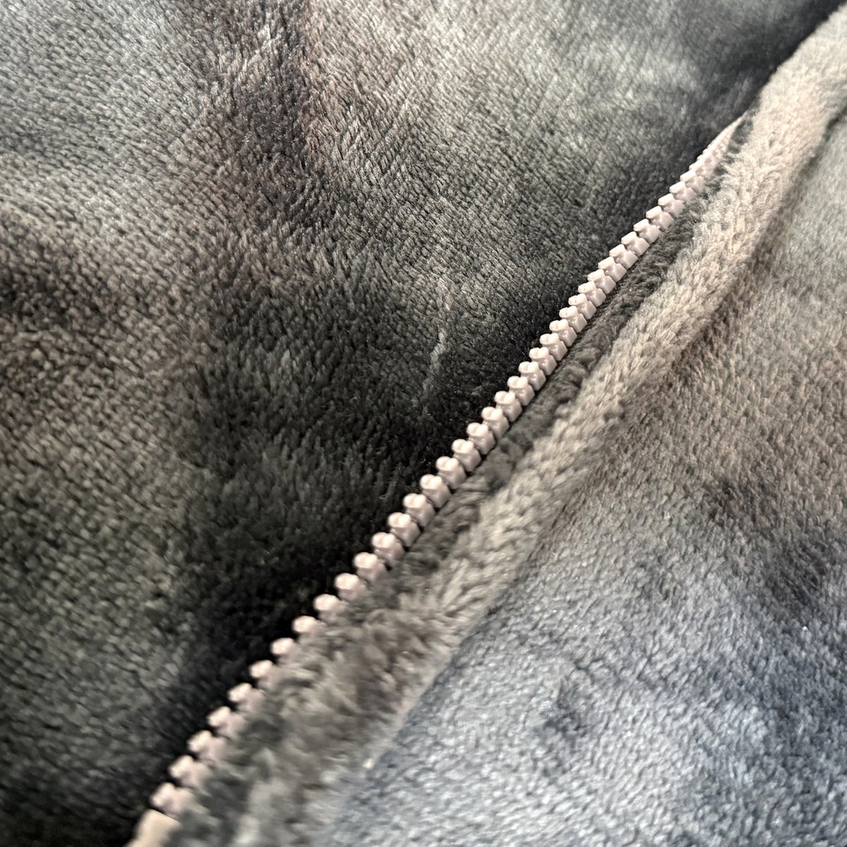 Zipper detail on the Clarech heated shawl